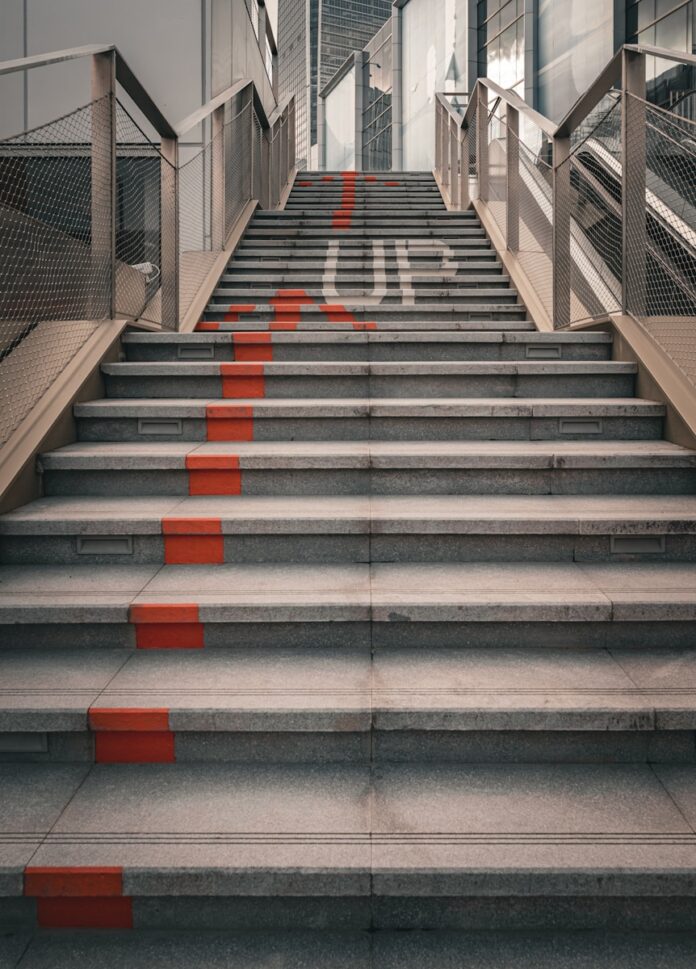 A set of stairs leading up to a building