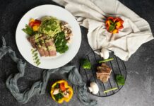 집밥 식단의 건강 트렌드, 나만의 ‘하루 한 끼 건강하게’ 실천법 a white plate topped with meat and veggies