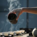 현대인의 건강을 위한 대체요법, 일상 속 실천법은? person pouring hot water on white cup